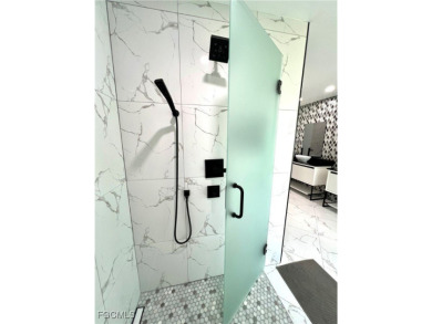 Modern Elegance Meets Florida Living in Imperial Golf Estates!