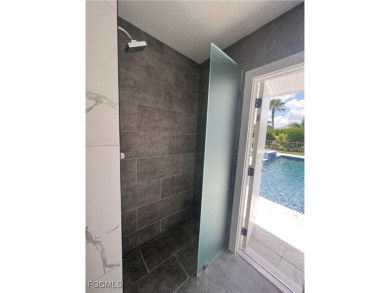 Modern Elegance Meets Florida Living in Imperial Golf Estates!