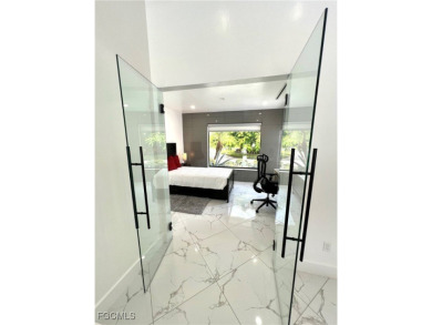 Modern Elegance Meets Florida Living in Imperial Golf Estates!