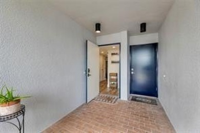 THIS STUNNING GROUND FLOOR UNIT HAS BEEN TOTALLY RENOVATED IN