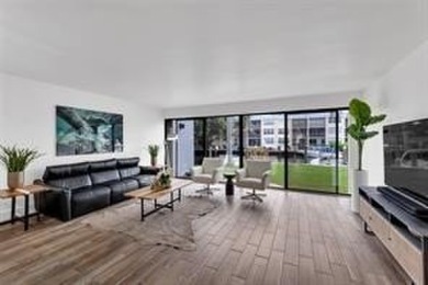 THIS STUNNING GROUND FLOOR UNIT HAS BEEN TOTALLY RENOVATED IN