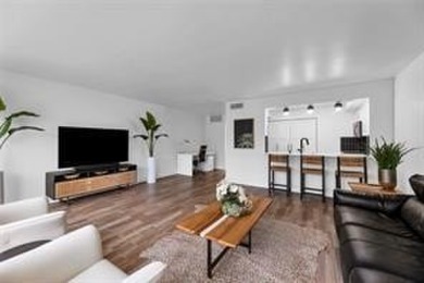 THIS STUNNING GROUND FLOOR UNIT HAS BEEN TOTALLY RENOVATED IN