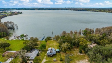 Nestled on nearly two acres of lush, tranquil land, this