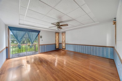 Nestled on nearly two acres of lush, tranquil land, this