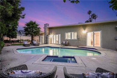 Enjoy coastal living in this inviting pool home with ocean views