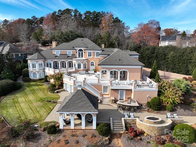 Truly a dream lakefront home on Badin Lake! With panoramic lake