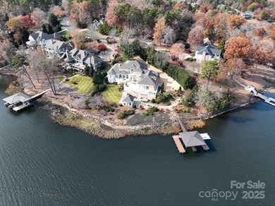 Truly a dream lakefront home on Badin Lake! With panoramic lake