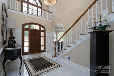 Truly a dream lakefront home on Badin Lake! With panoramic lake