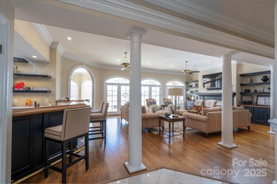 Truly a dream lakefront home on Badin Lake! With panoramic lake