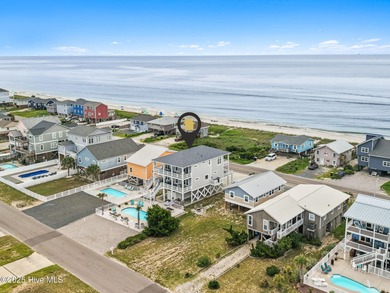 Welcome to 1012 W Beach Drive, an exceptional second-row beach