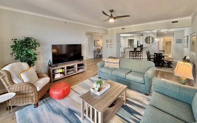 Nicely updated three-bedroom, three-bath ocean view corner unit