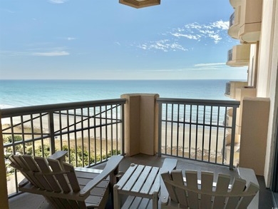 Nicely updated three-bedroom, three-bath ocean view corner unit