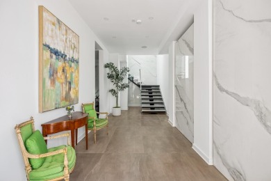 This remarkable contemporary residence on prestigious Murray