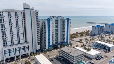 Experience unbeatable oceanfront living in this beautifully