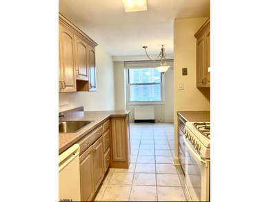 RARE SOUTHSIDE Condo in one of the Most Desirable Beachfront