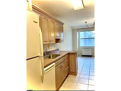 RARE SOUTHSIDE Condo in one of the Most Desirable Beachfront