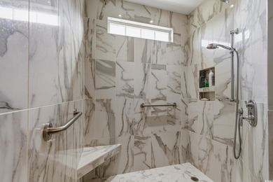 Come see this stunning *LAKE FRONT*custom built home located in