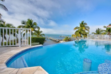 Nestled on a secluded 2-acre lot in Grassy Key, Marathon, this