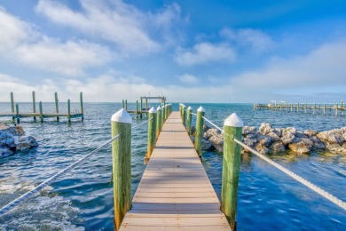 Nestled on a secluded 2-acre lot in Grassy Key, Marathon, this
