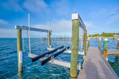 Nestled on a secluded 2-acre lot in Grassy Key, Marathon, this