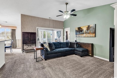 Spacious third-floor two-bedroom, two-bath condo located in an