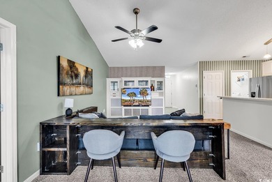 Spacious third-floor two-bedroom, two-bath condo located in an