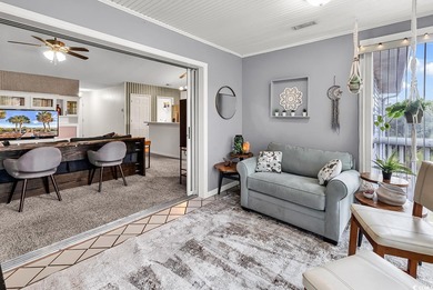 Spacious third-floor two-bedroom, two-bath condo located in an