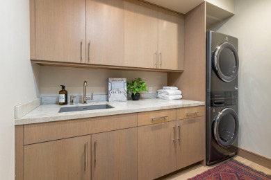 Stunning second floor luxury condominium in the heart of