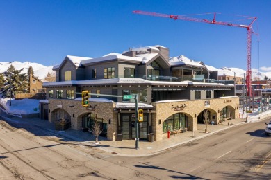 Stunning second floor luxury condominium in the heart of