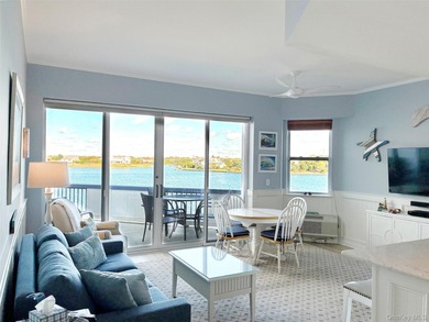 Experience coastal living at its finest in this beautifully