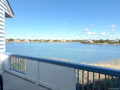 Experience coastal living at its finest in this beautifully