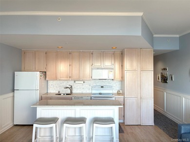 Experience coastal living at its finest in this beautifully