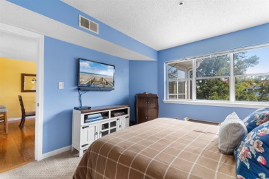 Enjoy top floor views & no noise above in this 4th floor