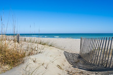 Location, Location! Only steps from putting your feet in the