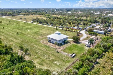 ABSOLUTELY NO FLOOD DAMAGE! Come live the Florida lifestyle in