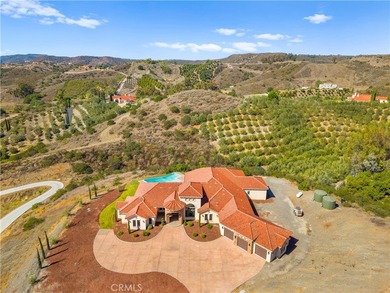 Perched high above Cross Creek Golf Course in the prestigious De