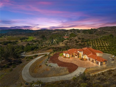 Perched high above Cross Creek Golf Course in the prestigious De