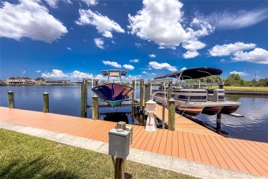 Gulf Access Gem with Private Elevator & Deeded Boat Dock!  This