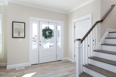 Experience the epitome of coastal living with this stunning new