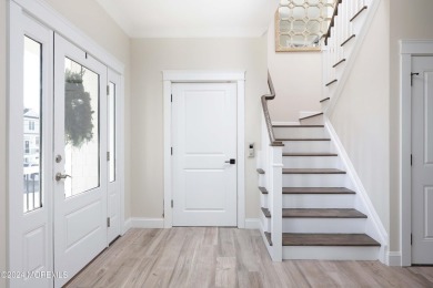 Experience the epitome of coastal living with this stunning new