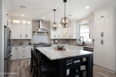 Experience the epitome of coastal living with this stunning new