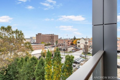 Luxury Downtown Living with Custom Finishes and Lake Views