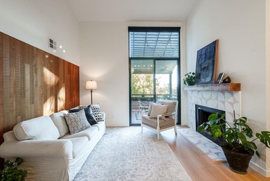 This prime, top-floor corner condo delivers the quintessential