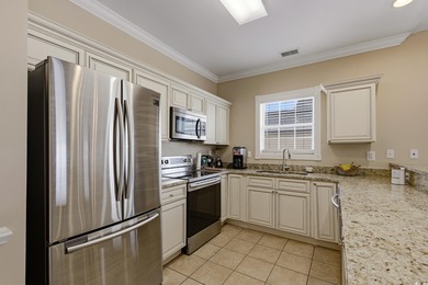 Top floor corner 3-bedroom condominium at Magnolia Pointe. These