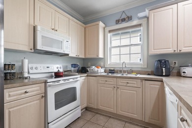 Step into this beautifully updated 3 bedroom, 2 bathroom condo