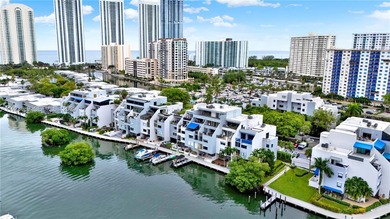 Welcome to the exclusive gated community of Poinciana Island in