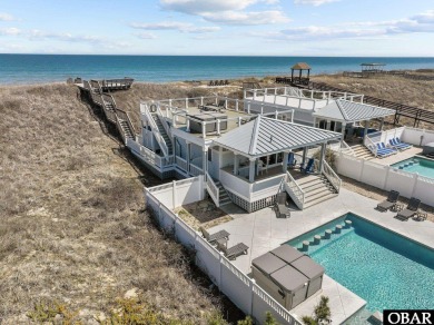A stunning oceanfront estate located in the heart of Kill Devil