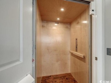 Custom-built 3-level residence with private elevator in a