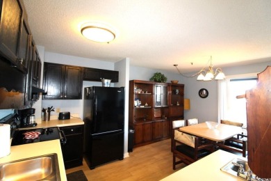 This 2BR/2BA condominium is located on the top floor of the