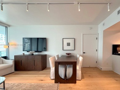 Envision a home where the city skyline becomes your backdrop and